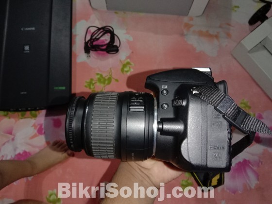 Nikon DSLR Camera D3100........18''/55'' mm